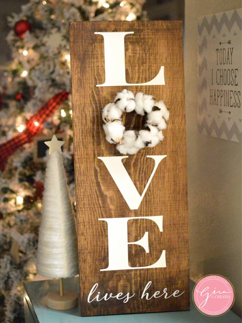 LOVE LIVES HERE WOOD SIGN WITH COTTON BALL WREATH