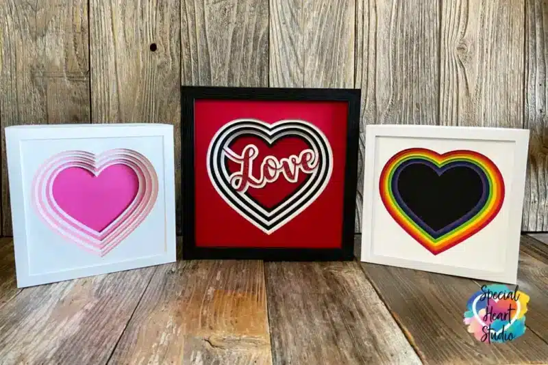 Layered heart shadow box Valentine's Day Projects with cardstock layers, free svg download.